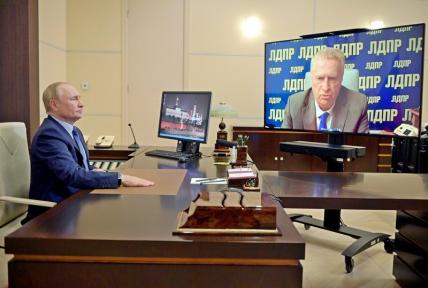 На фото: президент России Владимир Путин в Ново-Огарево во время встречи с лидером ЛДПР Владимиром Жириновским в формате видеоконференции. 05 октября 2021 года