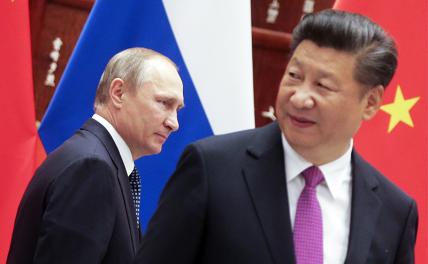 На фото: президент России Владимир Путин и председатель КНР Си Цзиньпин (слева направо) во время встречи