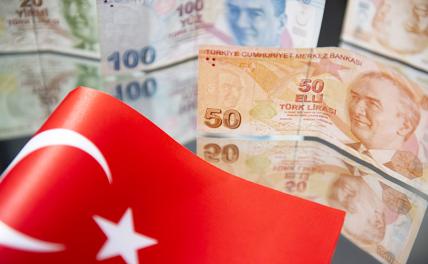 Турецкая лира упала к доллару на исторический минимум после повышения ключевой ставки