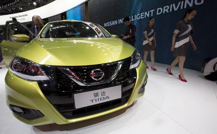 На фото:  Nissan Tiida