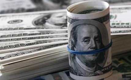 Курс доллара идет вниз вместе с нефтью