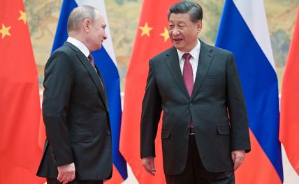 На фото: президент РФ Владимир Путин и председатель КНР Си Цзиньпин (слева направо)