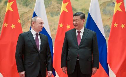 На фото: Владимир Путин и председатель КНР Си Цзиньпин (слева направо)