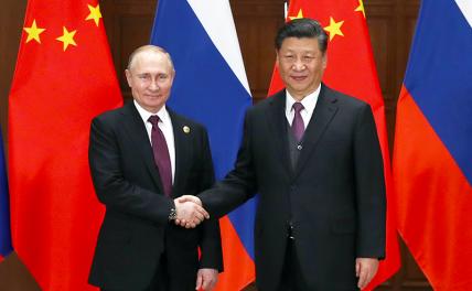 На фото: президент РФ Владимир Путин и председатель КНР Си Цзиньпин (слева направо)