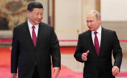 На фото: председатель КНР Си Цзиньпин и президент России Владимир Путин (слева направо)