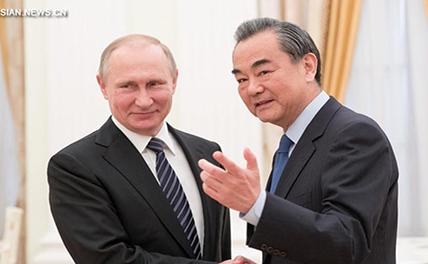 Президент России В.Путин встретился с Ван И