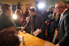 In the photo: Ukrainian comedian and actor Vladimir Zelensky (right) shakes hands with an employee of the Central Election Commission (CEC), while submitting documents for registration as a presidential candidate, Kiev, January 25, 2019