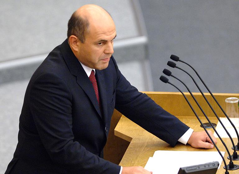 На фото: руководитель Федерального агентства кадастра объектов недвижимости Михаил Мишустин выступает на пленарном заседании Государственной думы РФ. 2005 год