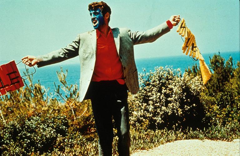 На фото: Жан-Поль Бельмондо в фильме "Пьеро", 1965