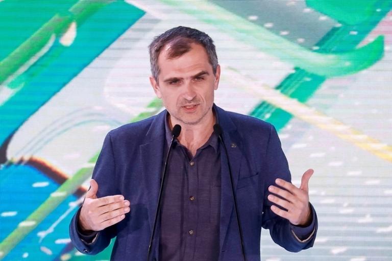 На фото: военно-политический блогер Юрий Подоляка во время выступления "Мир сегодня: Россия - Украина - Запад". 